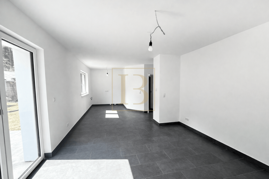 Heller Wohnbereich mit Terrassenzugang Doppelhaush�lfte S�dheide