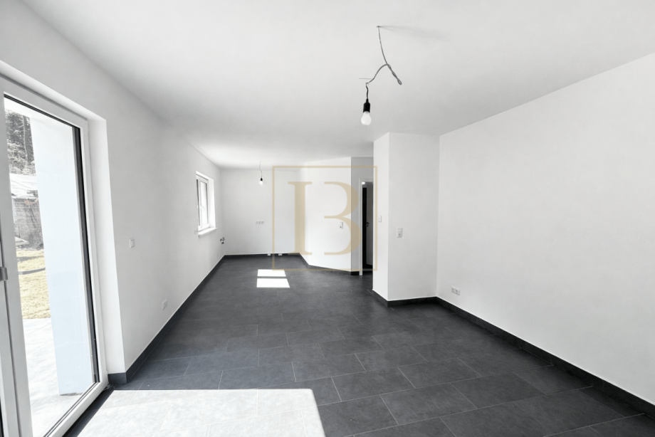 Heller Wohnbereich mit Terrassenzugang Doppelhaush�lfte S�dheide